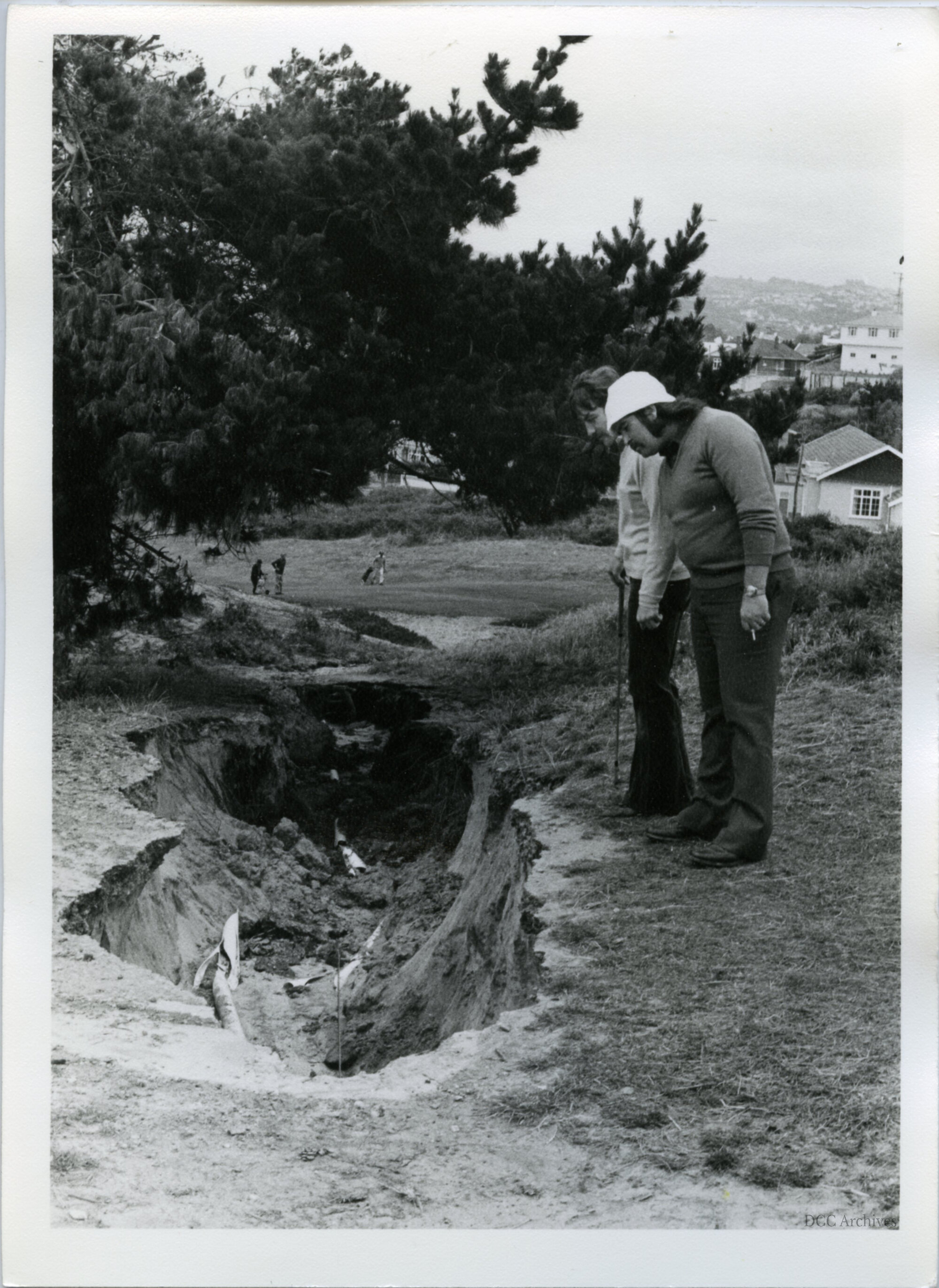Chisholm Park Golf Links, Players Inspecting Damage