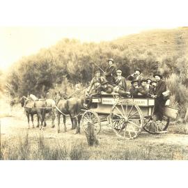 Group of Men on a Horse Carriage