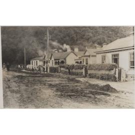 Cleaning Up Street After Flood of Leith
